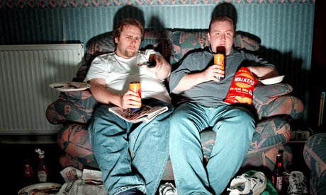 Men-lounge-on-sofa-watchi-008.jpg