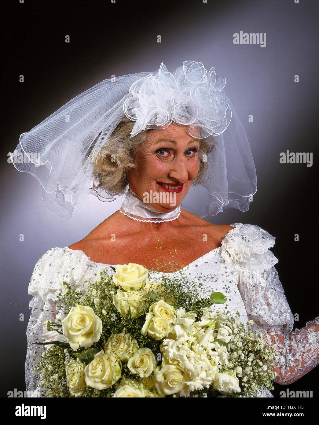 bride-senior-wedding-dress-veil-bridal-bouquet-facial-play-portrait-H3XTH5.jpg