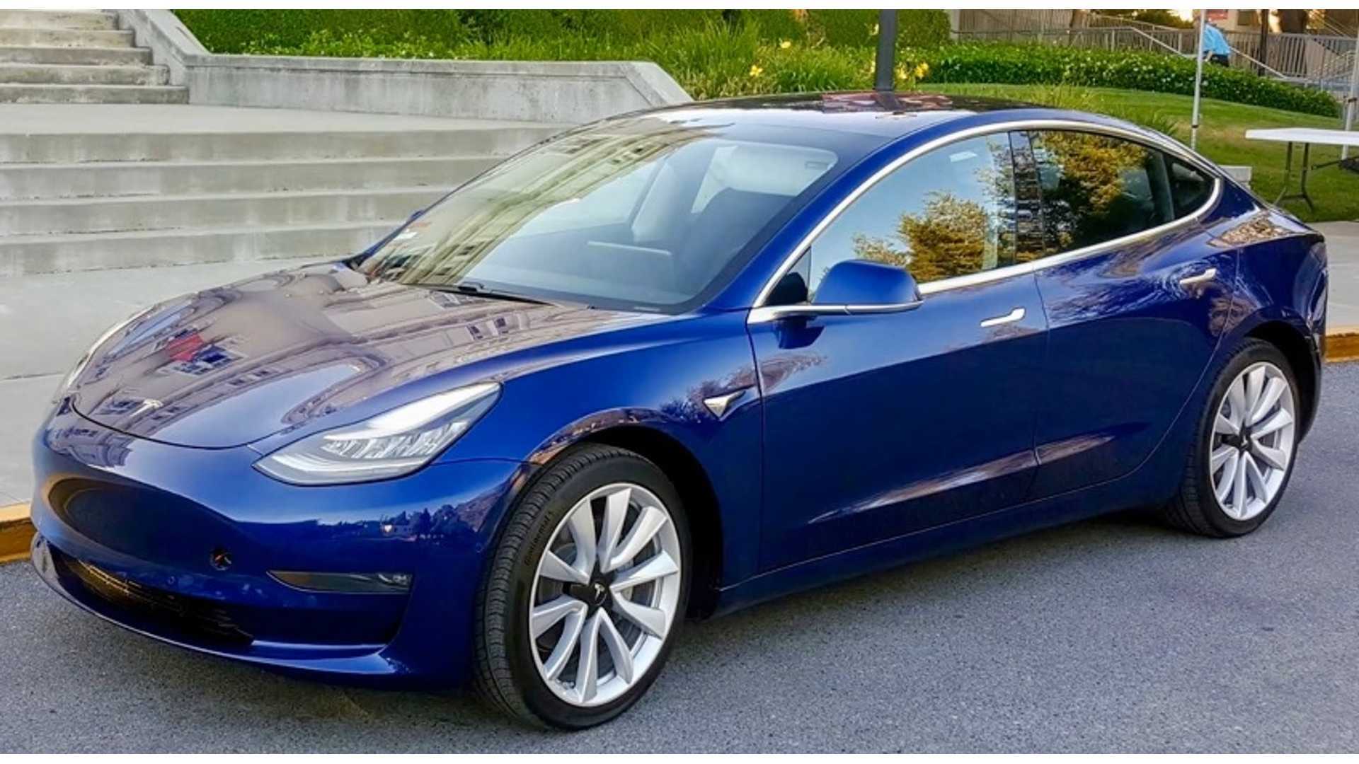 first-images-surface-of-tesla-model-3-aero-wheel-covers-removed.jpg