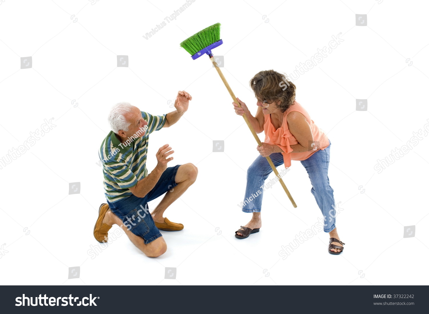 stock-photo-woman-beating-man-with-broom-37322242.jpg
